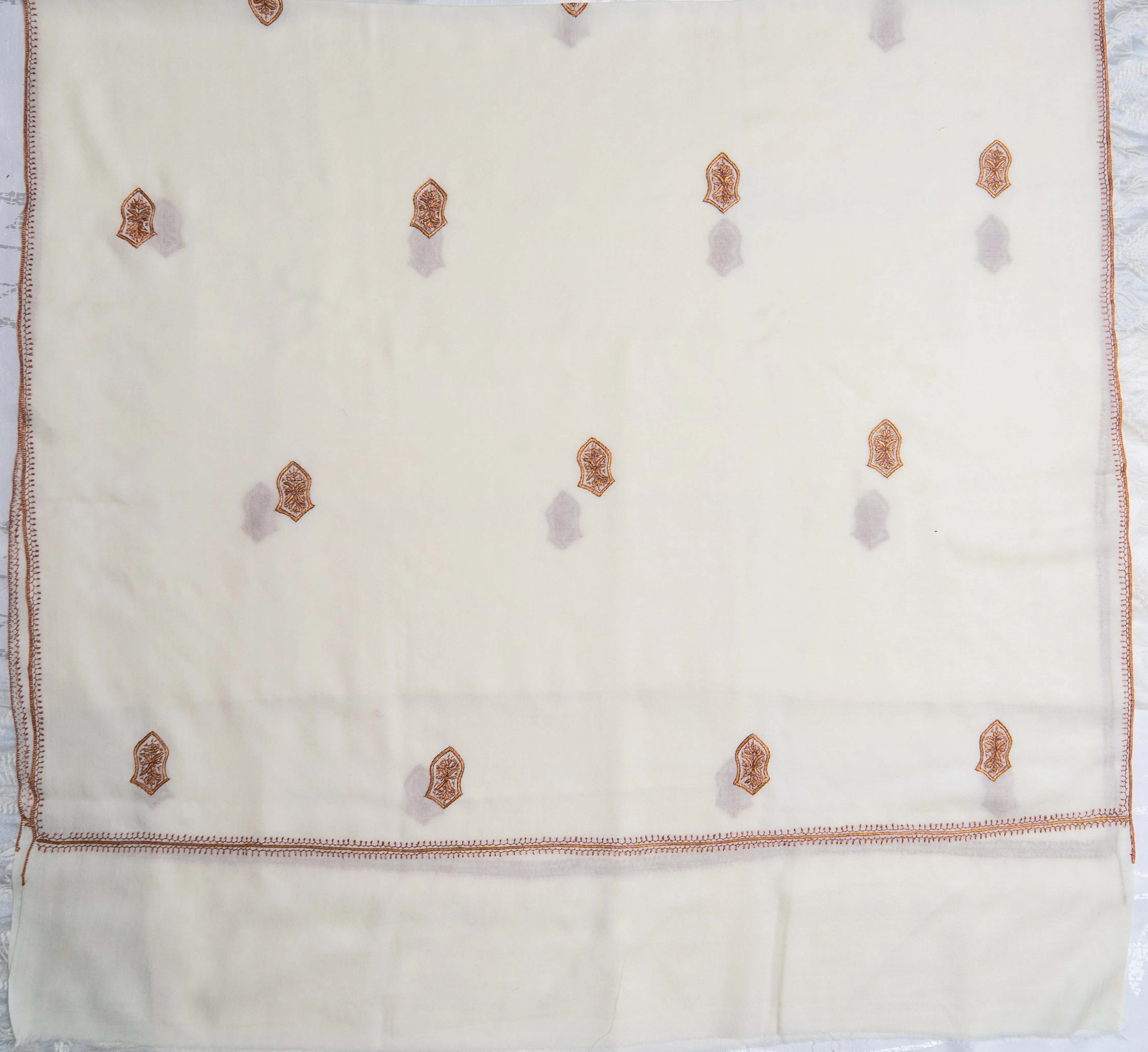 Ivory Elegance: Hand-Embroidered Sozni Merino Wool Shawl